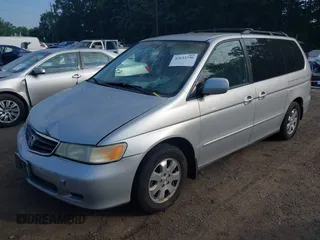 2003 Honda Odyssey EX-L with VIN 5FNRL18913B061340, listed as a IAAI auction lot 42633790 with 1,281,195 mi miles and . Bid and sale history available at DreamBid. Image 17.