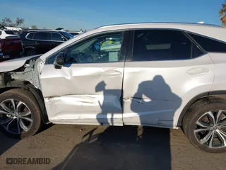 2022 Lexus RX with VIN 2T2HGMDA8NC074588, listed as a IAAI auction lot 41828234 with 106,845 mi miles. Bid and sale history available at carsss.com. Image 15.