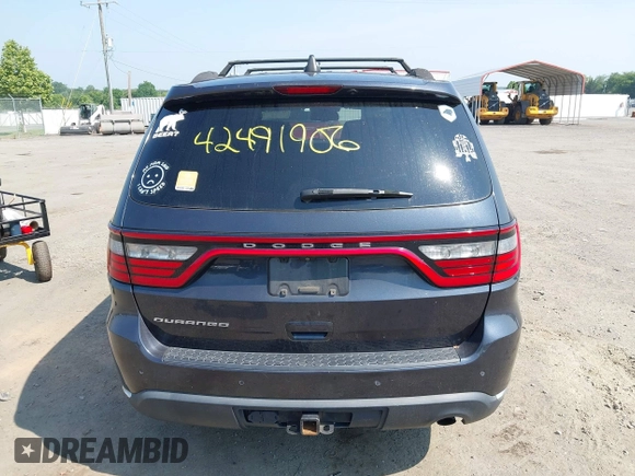 2015 Dodge Durango SXT with VIN 1C4RDHAG7FC869904, listed as a IAAI auction lot 42491906 with 120,396 mi miles and . Bid and sale history available at DreamBid. Image 16.