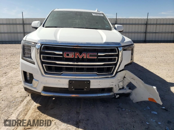 2024 GMC Yukon SLT with VIN 1GKS2BKD6RR237359, listed as a Copart auction lot 77892564 with 9,880 mi miles and Salvage Title. Bid and sale history available at carsss.com. Image 5.