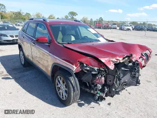 2015 Jeep Cherokee Latitude with VIN 1C4PJLCB0FW643402, listed as a IAAI auction lot 41811328 with 110,232 mi miles. Bid and sale history available at carsss.com. Image 1.