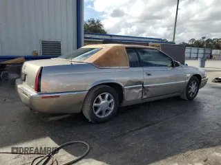 2000 Cadillac Eldorado z VIN 1G6EL12Y7YB703863, wystawiony jako Copart lot #85433244 z przebiegiem 175 416 mil mil oraz Szkoda całkowita • Salvage title. Historia ofert i sprzedaży dostępna na DreamBid. Obrazek 3.