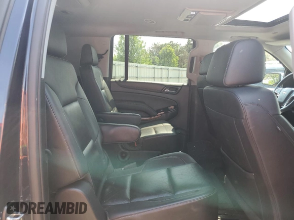 2017 Chevrolet Suburban Premier with VIN 1GNSKJKC7HR169222, listed as a Copart auction lot 49740933 with 117,295 mi miles and . Bid and sale history available at DreamBid. Image 12.