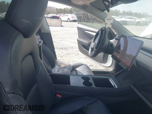 2022 Tesla Model 3 Long Range with VIN 5YJ3E1EB0NF106570, listed as a IAAI auction lot 41832622 with 52,679 mi miles and . Bid and sale history available at DreamBid. Image 5.