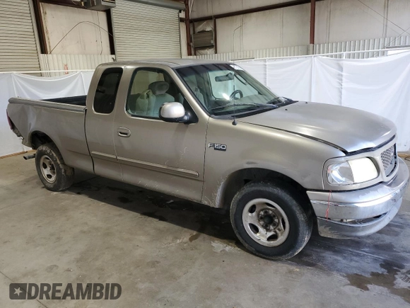 2003 Ford F-150 XL with VIN 1FTRX17283NA46215, listed as a Copart auction lot 85194094 with 168,415 mi miles and Salvage title. Bid and sale history available at DreamBid. Image 4.
