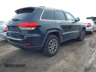 2014 Jeep Grand Cherokee Limited with VIN 1C4RJFBG4EC220054, listed as a IAAI auction lot 42050036 with 100,552 mi miles and . Bid and sale history available at DreamBid. Image 4.