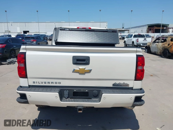 2014 Chevrolet Silverado 1500 High Country with VIN 3GCUKTEC4EG409072, listed as a IAAI auction lot 41986843 with 124,058 mi miles. Bid and sale history available at carsss.com. Image 17.