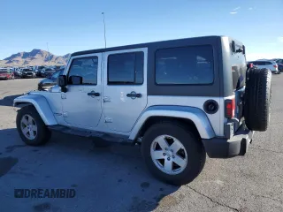 2007 Jeep Wrangler Unlimited Sahara with VIN 1J4GB59197L144781, listed as a Copart auction lot 48678315 with 137,538 mi miles and Salvage title. Bid and sale history available at DreamBid. Image 2.