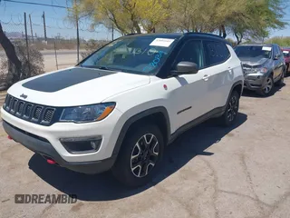 2019 Jeep Compass Trailhawk with VIN 3C4NJDDB4KT780239, listed as a IAAI auction lot 42095643 with 68,995 mi miles and . Bid and sale history available at DreamBid. Image 16.