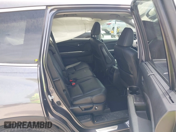 2021 Honda Pilot Special Edition with VIN 5FNYF5H27MB046775, listed as a IAAI auction lot 41867951 with 66,108 mi miles and . Bid and sale history available at DreamBid. Image 8.