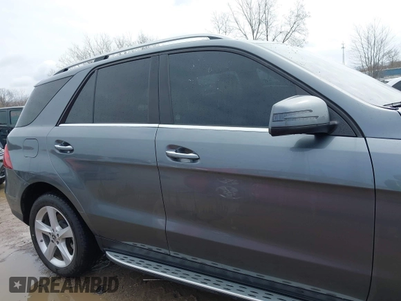 2018 Mercedes-Benz GLE 350 z VIN 4JGDA5JB0JB147786, wystawiony jako IAAI lot #42005953 z przebiegiem 138 905 mil mil oraz . Historia ofert i sprzedaży dostępna na DreamBid. Obrazek 14.
