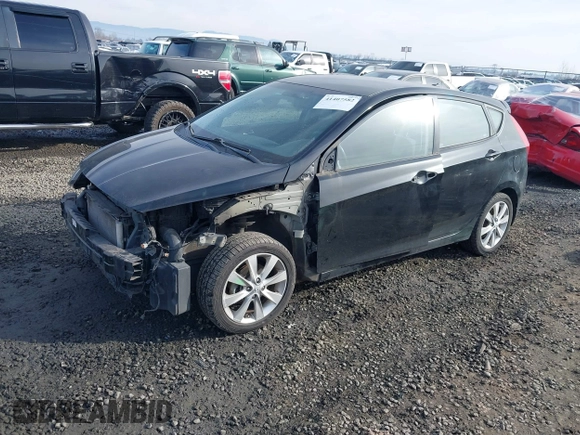 2012 Hyundai Accent SE with VIN KMHCU5AEXCU053645, listed as a IAAI auction lot 41407582 with 118,290 mi miles. Bid and sale history available at carsss.com. Image 2.