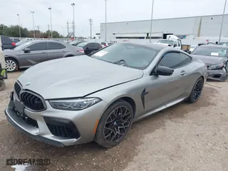 2020 BMW M8 with VIN WBSAE0C02LCE17524, listed as a IAAI auction lot 41374594 with 48,197 mi miles. Bid and sale history available at carsss.com. Image 2.