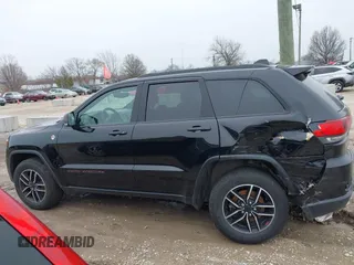 2019 Jeep Grand Cherokee Trailhawk with VIN 1C4RJFLT3KC554292, listed as a IAAI auction lot 41953049 with 31,672 mi miles and . Bid and sale history available at DreamBid. Image 14.