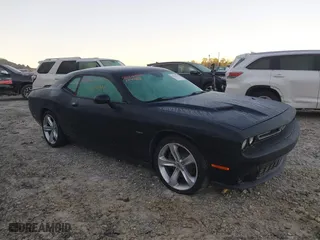 2017 Dodge Challenger R/T with VIN 2C3CDZBT9HH573634, listed as a IAAI auction lot 40476583 with 1 mi miles. Bid and sale history available at carsss.com. Image 1.