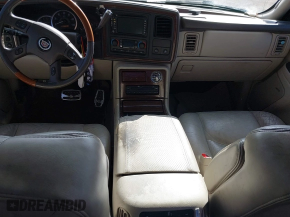 2004 Cadillac Escalade EXT z VIN 3GYEK62N94G191201, wystawiony jako IAAI lot #41747841 z przebiegiem 229 057 mil mil oraz . Historia ofert i sprzedaży dostępna na DreamBid. Obrazek 16.