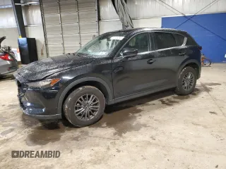 2021 Mazda CX-5 Touring z VIN JM3KFBCM3M1372568, wystawiony jako Copart lot #57748295 z przebiegiem 79 719 mil mil oraz Szkoda całkowita • Salvage title. Historia ofert i sprzedaży dostępna na DreamBid. Obrazek 1.