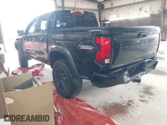 2023 Chevrolet Colorado 4WD Trail Boss with VIN 1GCPTEEK3P1261771, listed as a IAAI auction lot 42535710 with 30,000 mi miles and . Bid and sale history available at DreamBid. Image 3.