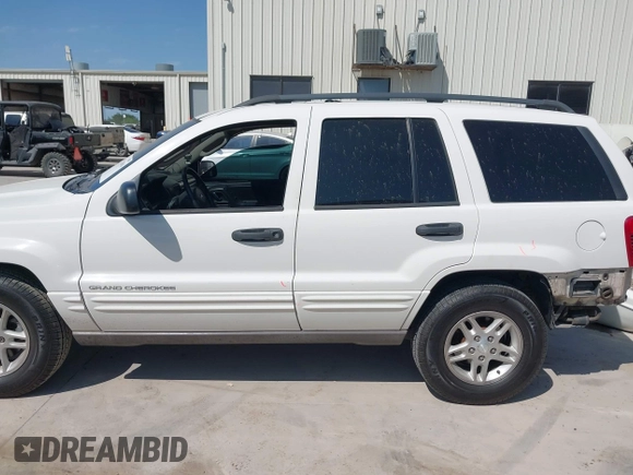 2003 Jeep Grand Cherokee Laredo with VIN 1J4GX48S43C518584, listed as a IAAI auction lot 42213094 with 163,743 mi miles and . Bid and sale history available at DreamBid. Image 15.