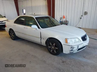 1999 Acura RL with VIN JH4KA9661XC007276, listed as a IAAI auction lot 41686607 with 249,992 mi miles. Bid and sale history available at carsss.com. Image 1.