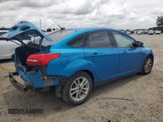 2016 Ford Focus SE z VIN 1FADP3F21GL386580, wystawiony jako Copart lot #63326425 z przebiegiem 82 139 mil mil oraz Szkoda całkowita • Salvage title. Historia ofert i sprzedaży dostępna na DreamBid. Obrazek 3.