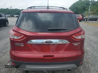 2016 Ford Escape Titanium with VIN 1FMCU9J90GUA02736, listed as a Copart auction lot 63068165 with 23,860 mi miles and Salvage title. Bid and sale history available at DreamBid. Image 6.