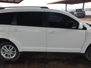 2017 Dodge Journey SXT z VIN 3C4PDDBG2HT595307, wystawiony jako IAAI lot #41813975 z przebiegiem 192 659 mil mil oraz . Historia ofert i sprzedaży dostępna na DreamBid. Obrazek 12.