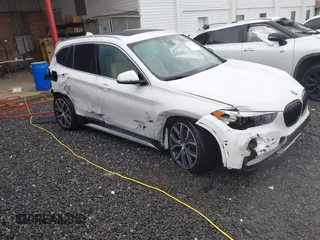 2017 BMW X1 xDrive28i with VIN WBXHT3C36H5F74818, listed as a IAAI auction lot 41853836 with 71,735 mi miles and . Bid and sale history available at DreamBid. Image 1.