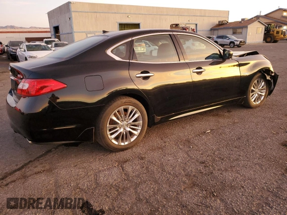 2012 Infiniti M Hybrid with VIN JN1EY1AP0CM910053, listed as a Copart auction lot 85345224 with 121,711 mi miles and Salvage title. Bid and sale history available at DreamBid. Image 3.