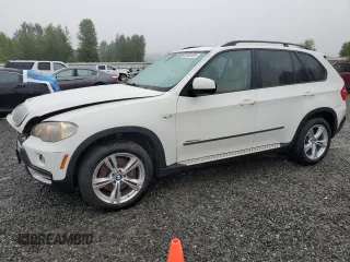 2010 BMW X5 35d with VIN 5UXFF0C53ALT85259, listed as a Copart auction lot 61952555 with 197,535 mi miles and Salvage title. Bid and sale history available at DreamBid. Image 1.