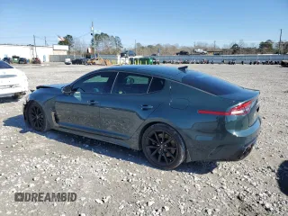 2023 Kia Stinger GT2 with VIN KNAE55LC0P6136420, listed as a Copart auction lot 87606705 with 72,990 mi miles and Salvage Title. Bid and sale history available at carsss.com. Image 2.