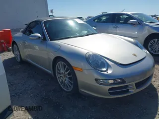 2006 Porsche 911 Carrera S z VIN WP0CB29976S766616, wystawiony jako IAAI lot #42119525 z przebiegiem 57 164 mil mil oraz . Historia ofert i sprzedaży dostępna na DreamBid. Obrazek 1.