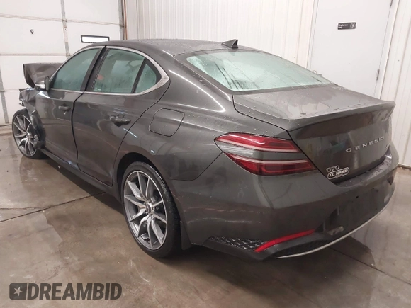 2022 Genesis G70 2.0T with VIN KMTG34TA3NU099724, listed as a IAAI auction lot 41384087 with 46,041 mi miles. Bid and sale history available at carsss.com. Image 3.