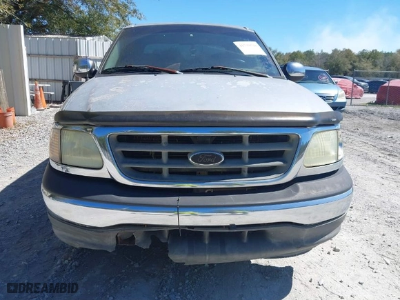 2002 Ford F-150 XLT with VIN 1FTRW07642KC65138, listed as a IAAI auction lot 41739516 with 354,140 mi miles. Bid and sale history available at carsss.com. Image 6.