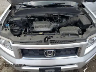 2007 Honda Ridgeline RTX z VIN 2HJYK16397H550965, wystawiony jako Copart lot #59168595 z przebiegiem 240 646 mil mil oraz Tytuł czysty. Historia ofert i sprzedaży dostępna na DreamBid. Obrazek 11.