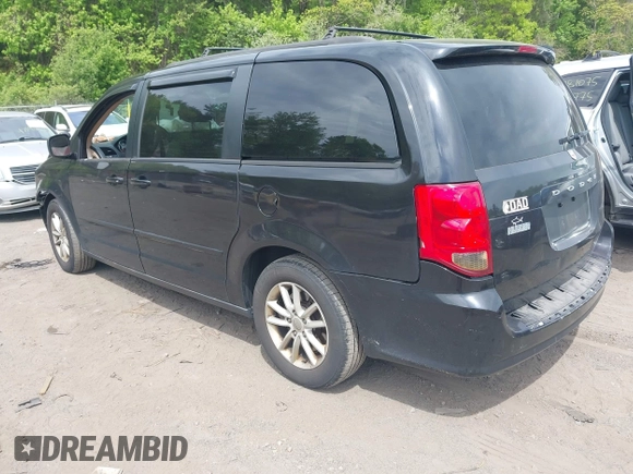 2014 Dodge Grand Caravan SXT z VIN 2C4RDGCGXER267110, wystawiony jako IAAI lot #42251423 z przebiegiem 146 198 mil mil oraz . Historia ofert i sprzedaży dostępna na DreamBid. Obrazek 3.