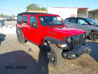 2022 Jeep Wrangler Unlimited Willys with VIN 1C4HJXDN3NW129708, listed as a IAAI auction lot 42025893 with 14,548 mi miles and . Bid and sale history available at DreamBid. Image 1.