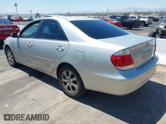 2006 Toyota Camry LE z VIN 4T1BF32K06U625986, wystawiony jako IAAI lot #42087979 z przebiegiem 202 550 mil mil oraz . Historia ofert i sprzedaży dostępna na DreamBid. Obrazek 3.