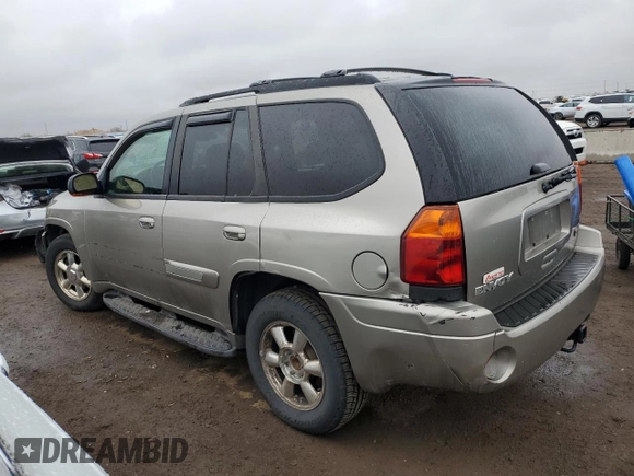 2002 GMC Envoy SLT with VIN 1GKDT13S222296226, listed as a Copart auction lot 51599295 with 148,653 mi miles and Salvage Title. Bid and sale history available at carsss.com. Image 2.