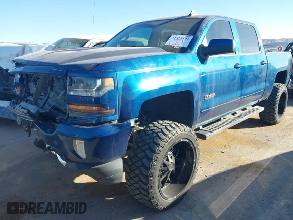 2017 Chevrolet Silverado 1500 LT with VIN 3GCUKREC8HG354004, listed as a IAAI auction lot 41429597 with 77,493 mi miles and . Bid and sale history available at DreamBid. Image 18.