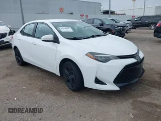 2019 Toyota Corolla L with VIN 5YFBURHE1KP930676, listed as a IAAI auction lot 41940047 with 82,885 mi miles. Bid and sale history available at carsss.com. Image 1.