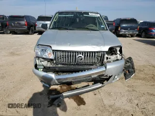 2005 Mercury Mariner Luxury z VIN 4M2YU56195DJ03528, wystawiony jako Copart lot #83315034 z przebiegiem 118 696 mil mil oraz Szkoda całkowita • Salvage title. Historia ofert i sprzedaży dostępna na DreamBid. Obrazek 5.