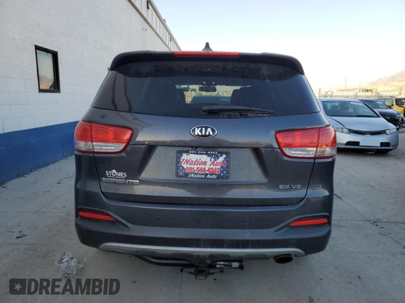 2016 Kia Sorento EX with VIN 5XYPHDA54GG111843, listed as a Copart auction lot 83006394 with 116,421 mi miles and Salvage Title. Bid and sale history available at carsss.com. Image 6.
