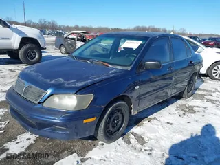 2003 Mitsubishi Lancer ES with VIN JA3AJ26E13U0A3996, listed as a IAAI auction lot 41251250 with 223,311 mi miles. Bid and sale history available at carsss.com. Image 16.