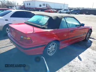 1996 BMW 3 Series with VIN WBABK7320TET61533, listed as a IAAI auction lot 41568603 with 102,552 mi miles and . Bid and sale history available at DreamBid. Image 4.