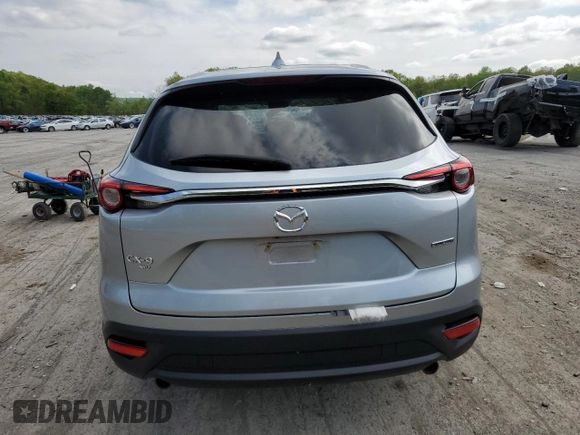 2023 Mazda CX-9 Touring Plus with VIN JM3TCBAY1P0659517, listed as a Copart auction lot 56396565 with 50,544 mi miles and Salvage title. Bid and sale history available at DreamBid. Image 6.