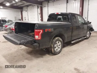 2015 Ford F-150 XLT with VIN 1FTEX1EP8FFC36723, listed as a IAAI auction lot 41738159 with 118,521 mi miles. Bid and sale history available at carsss.com. Image 4.