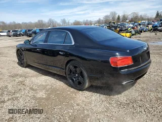 2014 Bentley Flying Spur with VIN SCBEC9ZA7EC095064, listed as a Copart auction lot 52218105 with 24,143 mi miles and Salvage title. Bid and sale history available at DreamBid. Image 2.