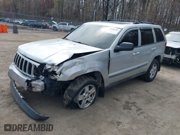 2007 Jeep Grand Cherokee Laredo with VIN 1J8HR48P77C570936, listed as a IAAI auction lot 41945531 with 200,821 mi miles. Bid and sale history available at carsss.com. Image 17.