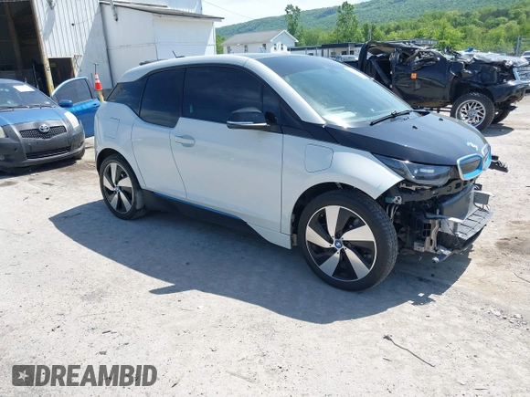 2015 BMW i3 z VIN WBY1Z4C58FV501754, wystawiony jako IAAI lot #42220253 z przebiegiem 59 022 mil mil oraz . Historia ofert i sprzedaży dostępna na DreamBid. Obrazek 1.